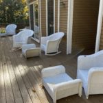 5 white outdoor wicker chairs