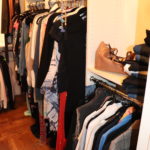 clothes hanging up on rack
