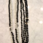 Long Strand Of Pearls In The Style Of Chanel & Black Cameo Necklace