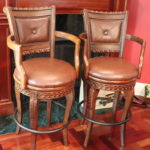 Pair Of Wooden Detailed Swivel Bar Stools