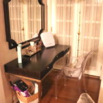 vanity with acrylic chair