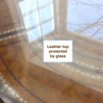 leather top table protected with glass