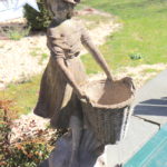 Girl Harvesting Cement Statue