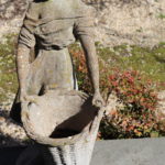 Girl Harvesting Cement Statue