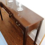 Narrow Wood Console Table With Star Fish Etched Hurricane Lamps