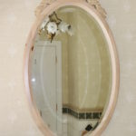 Large Oval Wood Mirror With Decorative Carved Floral Crown