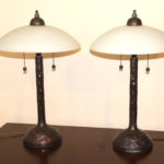 Pair Of Heavy Hand Hammered Lamps With Frosted Shades
