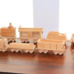 Set Of 11 Hand Carved Wood Trains