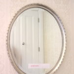 Silver-leaf Oval Mirror With Decorative Frame
