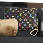 Assorted Women's Lot With Louis Vuitton Change Purse, Gucci Key Ring And Prada Nylon Makeup Case