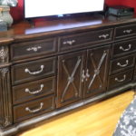 Large Wood Dresser With Center Cabinet By Ashley Furniture