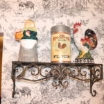 Ornate Metal Wall Shelf With Ceramic Rooster, Lady With Basket And Tin Flour Can