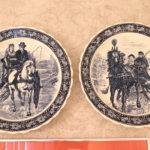 Pair Of Decorative Blue And White Wall Plates Horse And Buggy Stamped With Blue Lion Crest