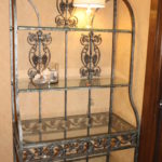 Ron Bakers Rack With Grapevine Design And Glass Shelves