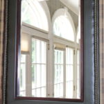 Leather Style Finished Mirror With Beveled Glass & Stud Trim From Franklin Home