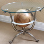 26" Round Beveled Glass Table With Metal And Globe Base