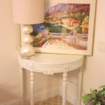 Off White Wood Demi-lune Occasional Table With Italian Themed Still Life By R. Ivanorie And Lamp