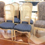 4 Floral Carved Single Caned Chairs And 2 Animal Printed Cushioned Arm Chairs