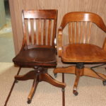 Pair Of Vintage Wood Office Chairs On Wheels.