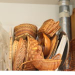 Cabinet Full Of Baskets, Trays, Baking Pans And Cutting Boards