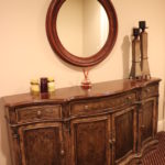 Large Buffet and Round Mirror
