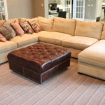 Large Sectional and Brown Leather Ottoman