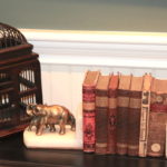 Decorative Brass And Marble Elephant Bookends With Birdcage And Antique Books In Assorted Condition