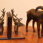 Deer Head Bookends And Carved Wrapped Ram Statue