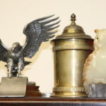 1Lot Of Decorative Items Including Mollahedeh Brass Urn, Eagle Figure & Stone Owl
