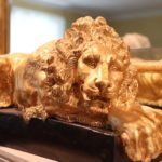 Pair Of Gold Cold Carved Recumbent Lions