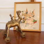 Signed Art By K. Chadapom And Decorative Brass Camel On Wheels