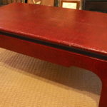 Contemporary Table With Red Coated Finish With Brass Feet