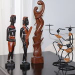 Lot Of Carved Wood Sculptures And Candle Holders