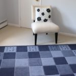 Crate & Barrel Contemporary Armless Chair With Linen Fabric And Blue Checker Pattern Rug