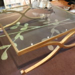 Glass and gold coffee table