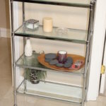 Glass Shelf with Decorative Items