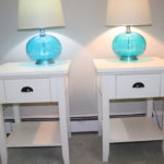 Set Of Matching White End Tables With Beautiful Blue Glass Lamps