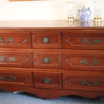 Cherry Wood Dresser With Decorative Brass Handles