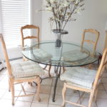 48" Round Glass Table With Metal Base And 4 White Washed Chairs