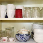 Cabinet Full Of Assorted Cups And Bowls