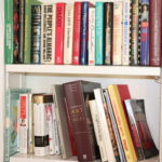 Mixed Lot Of Assorted Books Titles Include The People's Almanac, Cher, Art Through The Ages & More