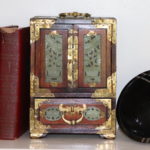 Small Handmade Asian Style Jewelry Box With Brass Detail And The Smithsonian Series Books