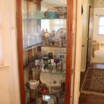 Glass Case with Decorative Items