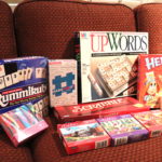 Lot Of Assorted Games And Puzzles Includes UpWords, Hedbanz, Scrabble And More