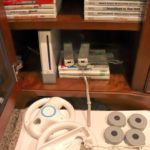 Large Nintendo Wii Lot Includes System, Games, Guitar And Controllers