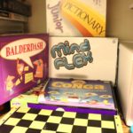 Lot Of Assorted Board Games Includes Balderdash, Conga, Mind Flex, And Pictionary Junior