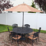 Quality 60" Round Metal Table With 6 Chairs And Umbrella