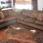 Custom Fabric 2 Piece Sectional Sofa With Studding Along Edges Includes Decorative Pillows