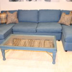 Large 3 Piece Sectional Sofa With Decorative Pillows And Coffee Table