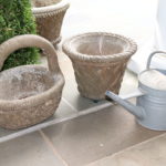 Pair Of Concrete Planters With Galvanized Metal Watering Can